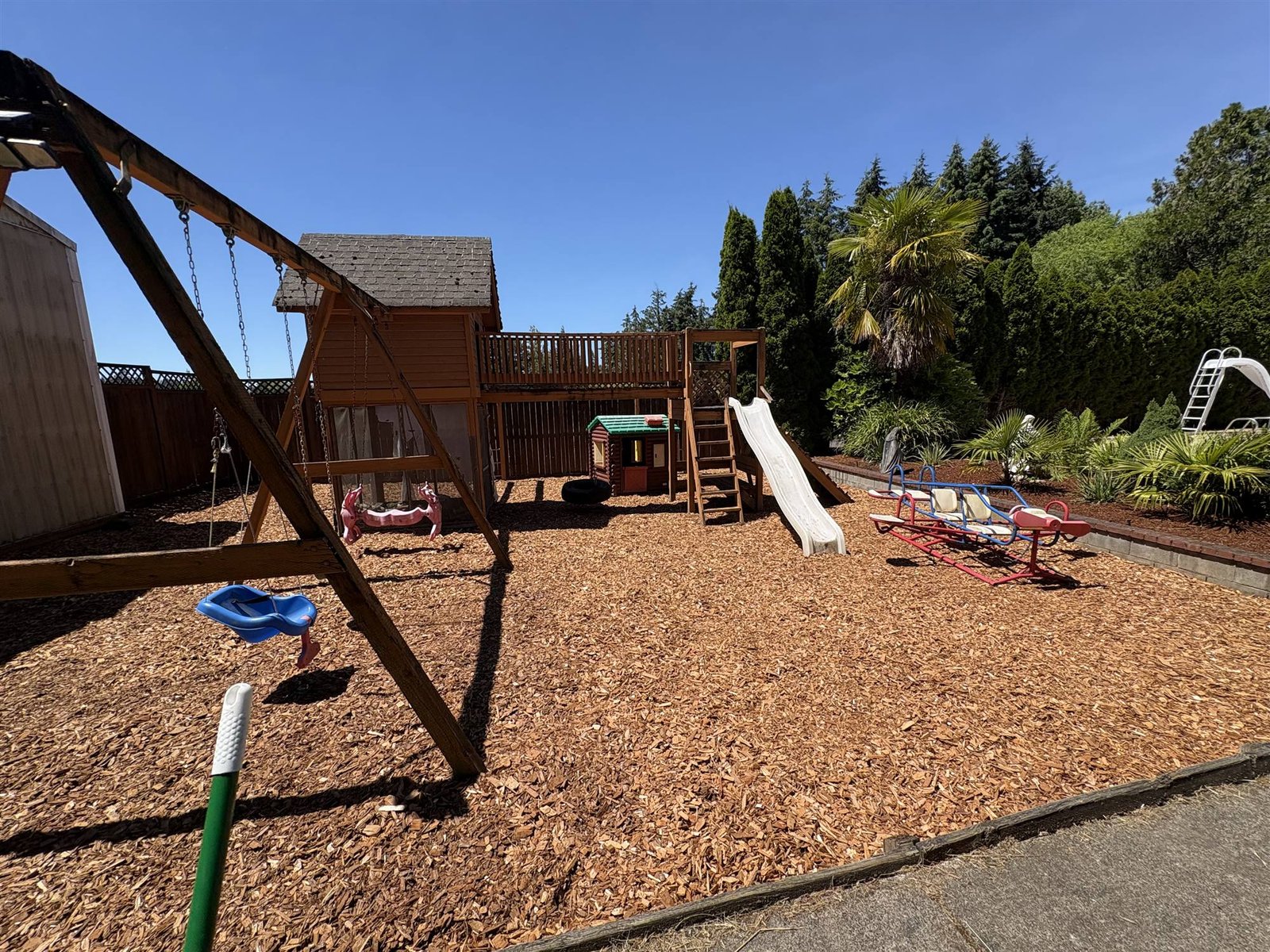 The play area with fresh bark dust laid